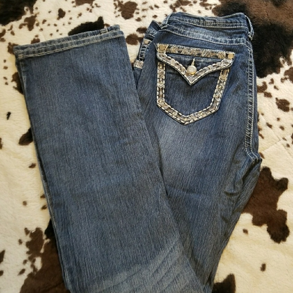 Boot cut rodeo jeans. Stretchy, fit like a,12/13.